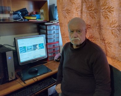 Portret Jurija Michajłowa Jurij Michajłow w swoim biurze na Ukrainie